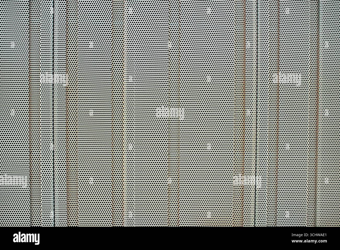 Die Textur brauner Lochbleche. Stockfoto