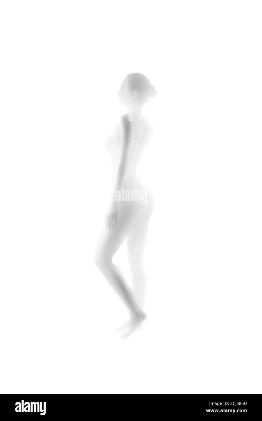 Schöne weibliche Silhouette mit hohem Ton Schwarzweiß verschwommenes Bild Stockfoto