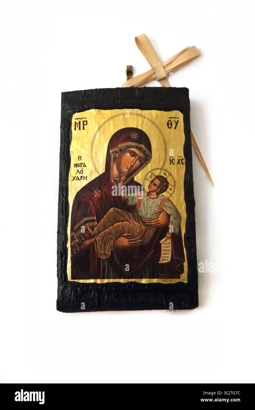 Griechische Ikone der Jungfrau Maria und des Kindes Jesus Christus mit Einem Palmblattkreuz Stockfoto