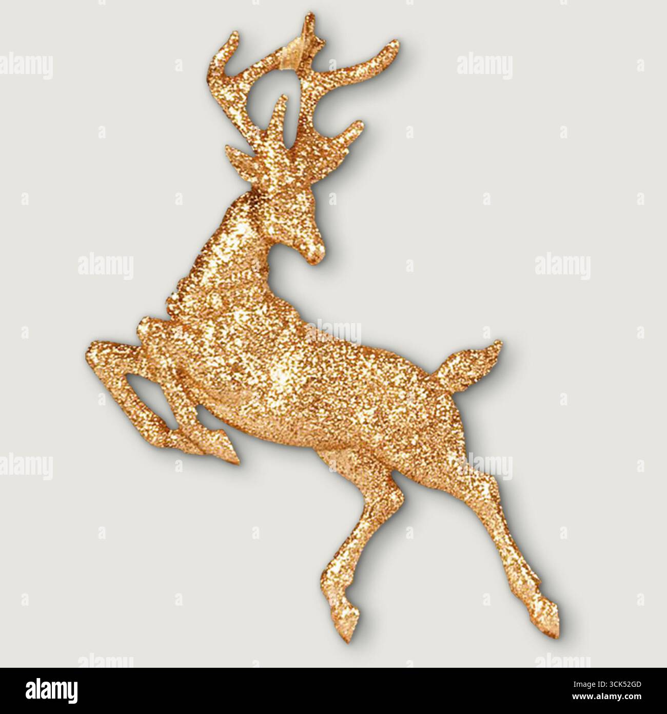 Eine glitzernde goldene Rentierfigur, ideal für festliche Dekorationen und Weihnachtsmotive. Stockfoto
