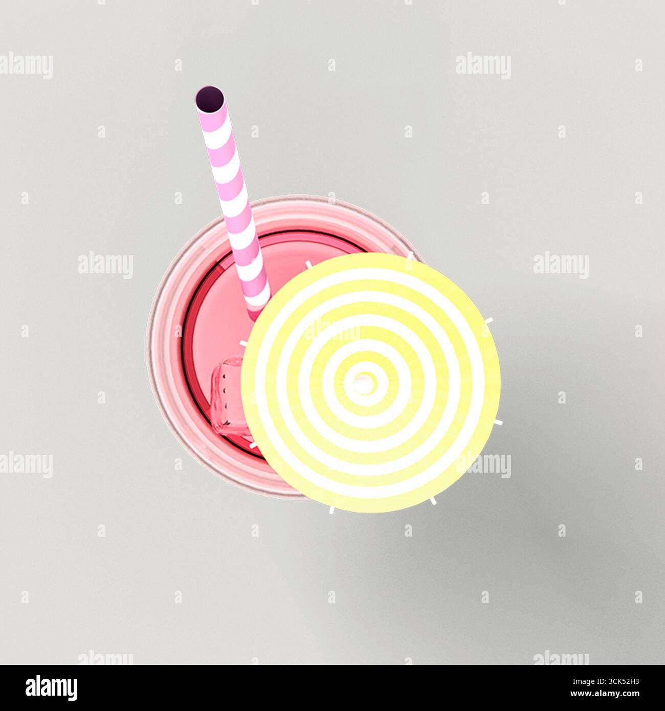 Ein farbenfrohes Getränk mit gestreiftem Stroh und einem spiralförmigen Deckel, platziert auf hellem Hintergrund. Stockfoto