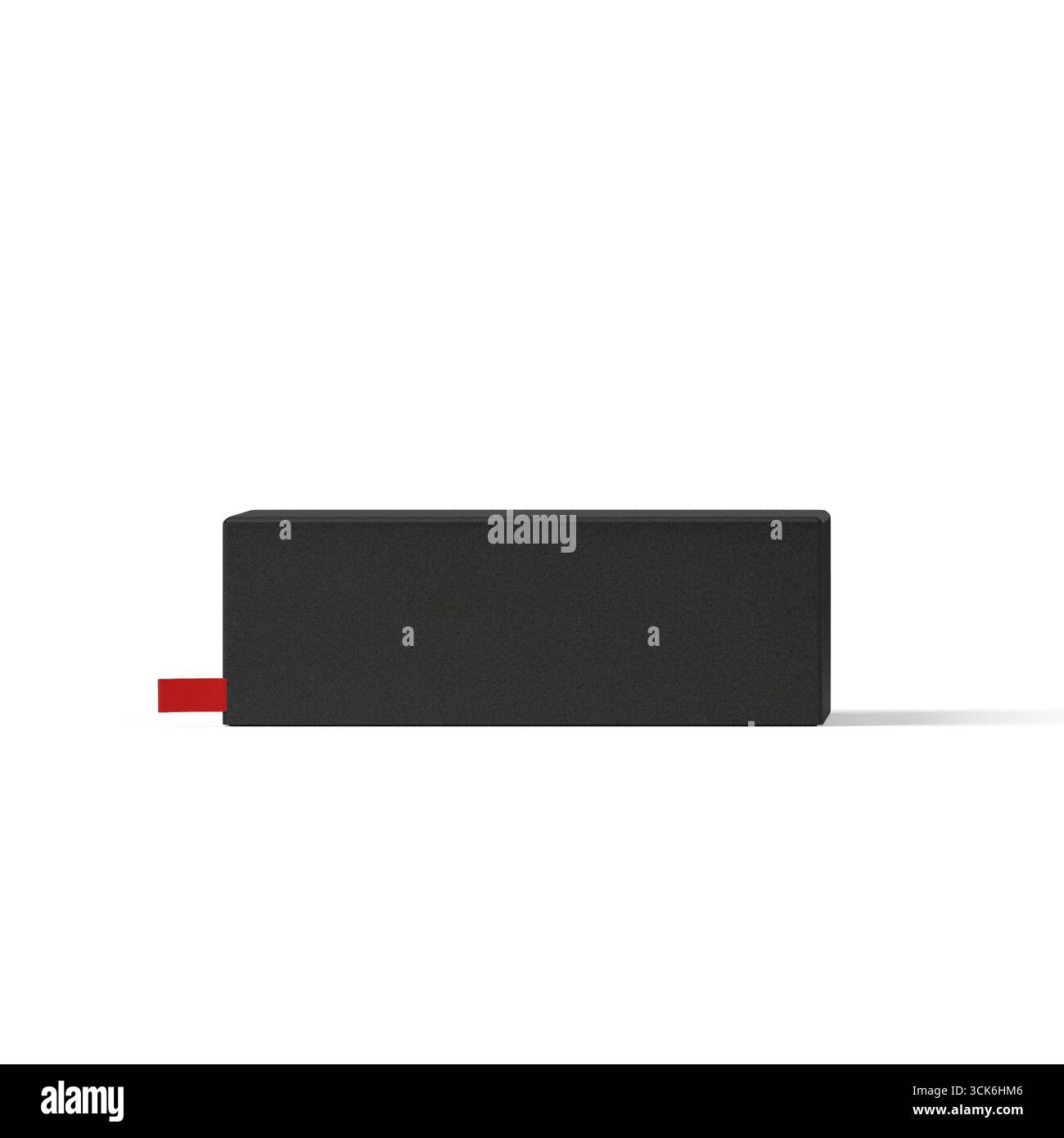 Ein elegantes, minimalistisches schwarzes Objekt mit rotem Akzent, das wahrscheinlich als tragbares Ladegerät oder technisches Zubehör dient. Stockfoto