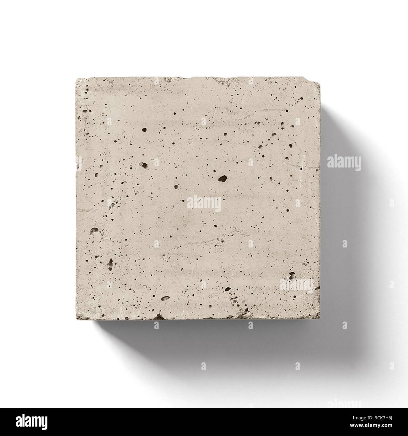 Ein quadratisches Stück strukturierter Beton mit neutralem Ton und gesprenkelter Oberfläche. Stockfoto