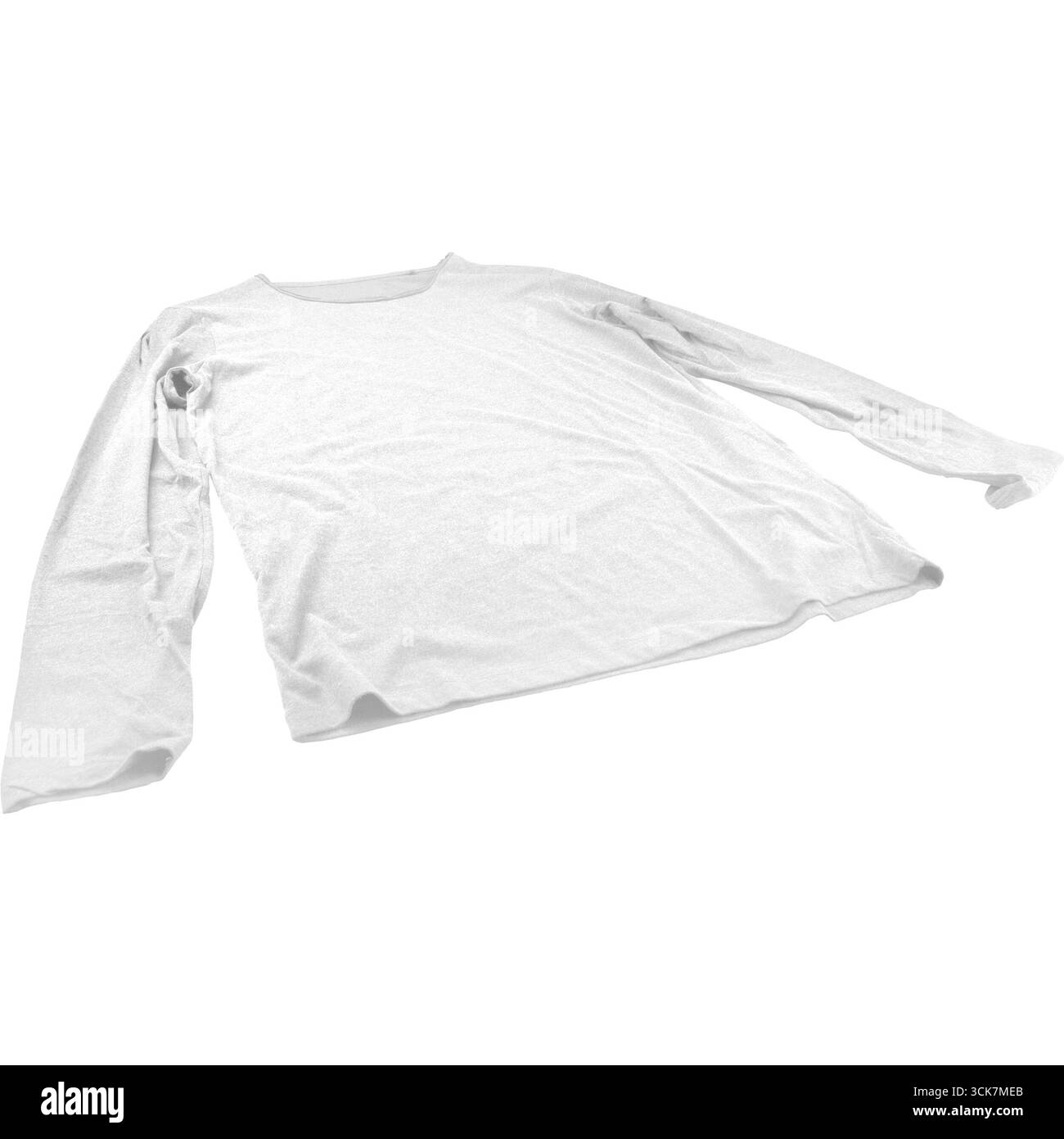 Ein schlichtes weißes langärmeliges Hemd, das flach liegt und Material und Design in Szene setzt. Stockfoto