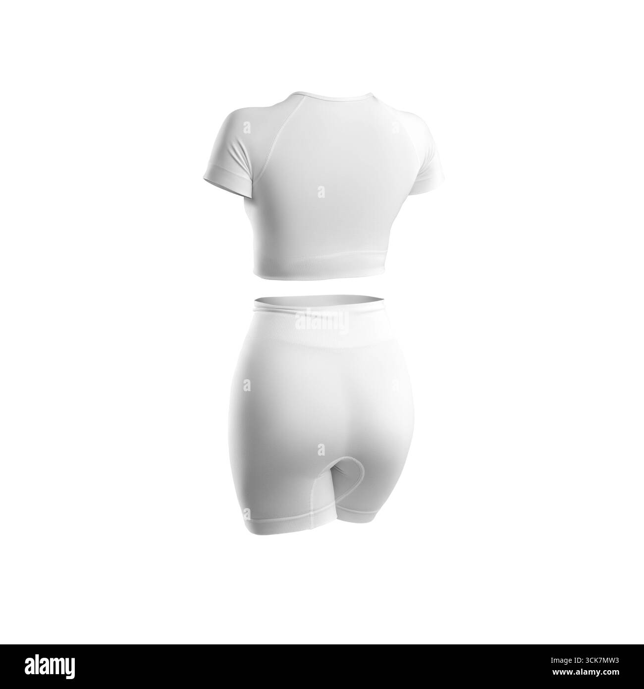 Ein weißes, sportliches Outfit, bestehend aus einem verkürzten Oberteil und Shorts, für Sport- und Fitnessaktivitäten. Stockfoto