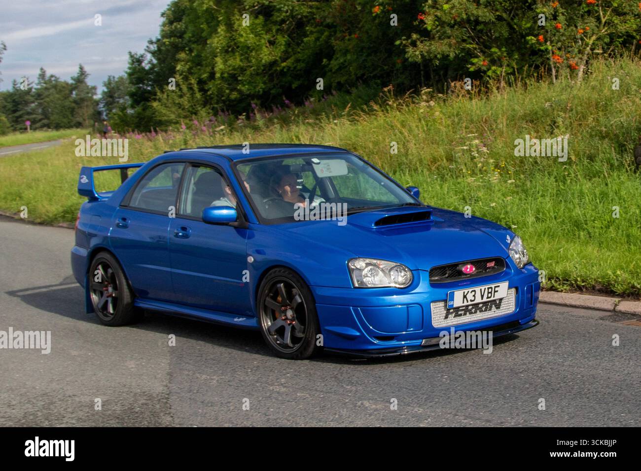 2003 Blue Subaru Impreza WRX-Sti Type UK Limousine Benzinmotor 1994 ccm; auf der Wheels Up North Weekender Oldtimer und Performance, Sammler und Enthusiasten Motorshow. Kendal, Großbritannien Stockfoto