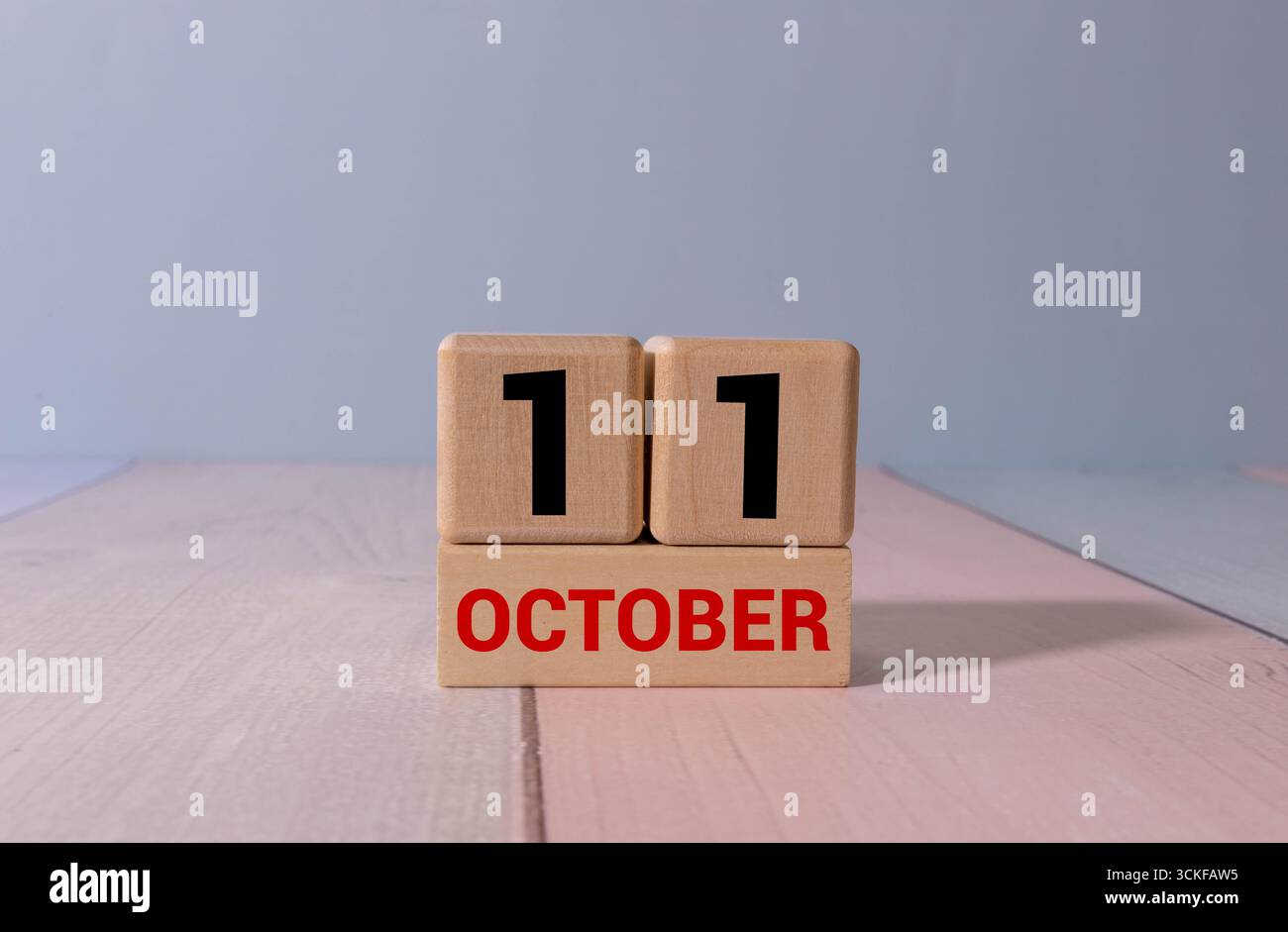 Oktobermonat, Termindatum mit Nummernwürfel. Datum 11 Stockfoto