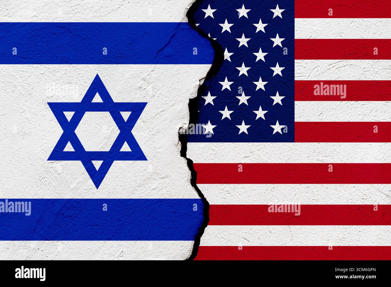 Die Flaggen des Staates Israel und der vereinigten staaten von amerika in eine zerrissene Mauer. Geopolitik und Kriegskonzept Stockfoto