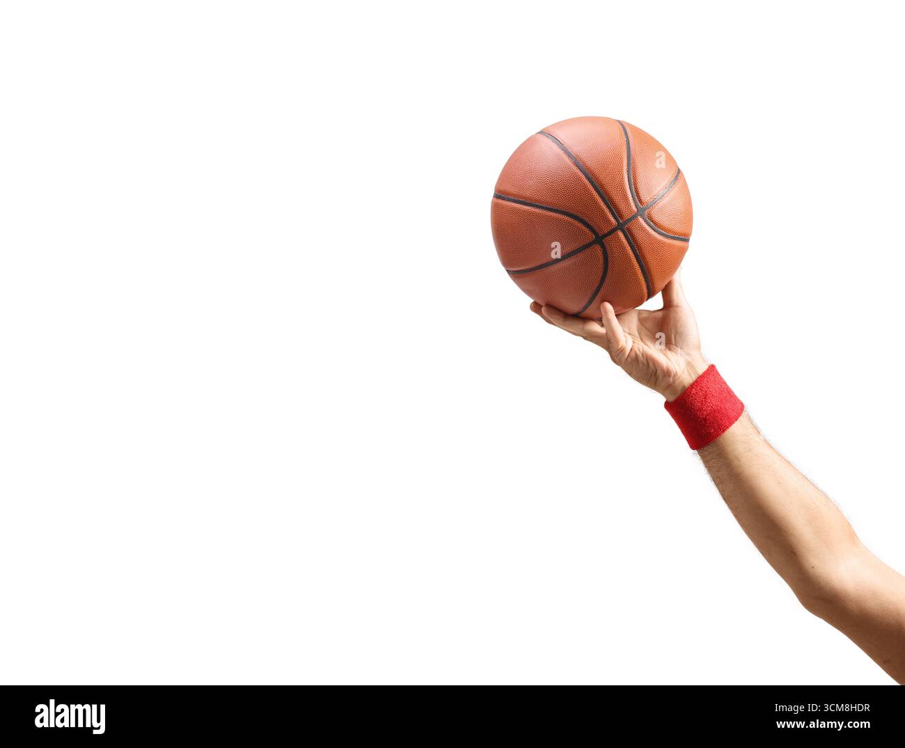 Männliche Hand, die einen Basketball isoliert auf weißem Hintergrund legt Stockfoto