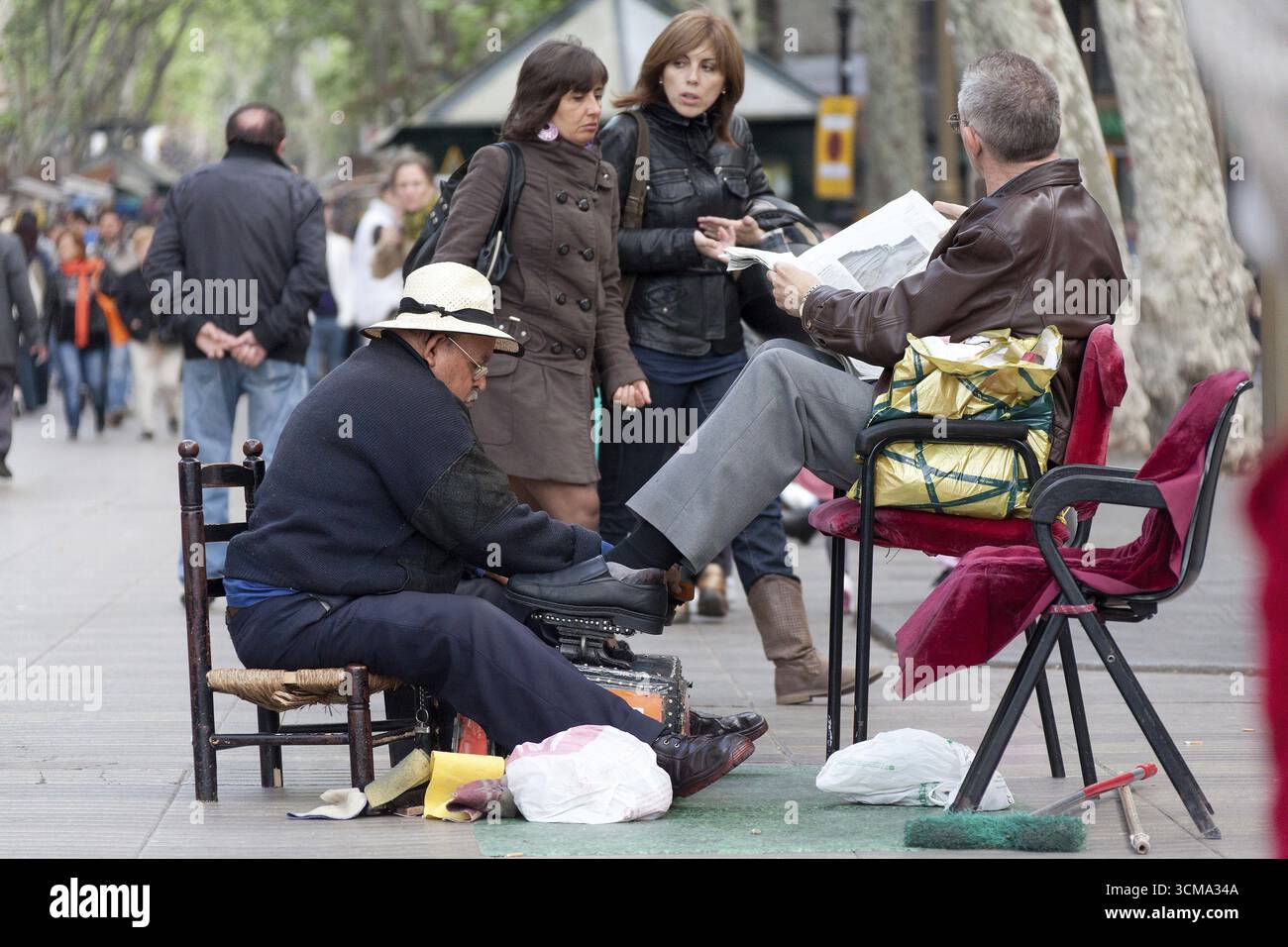 Schuhputzer auf der Rambla, Ramblas, Rambles, Fußgängerzone, Barcelona, Katalonien, Spanien, Europa, Stadtbesichtigung, Tourismus, Stadtbesichtigung Europa, Tourismuszentrum Stockfoto