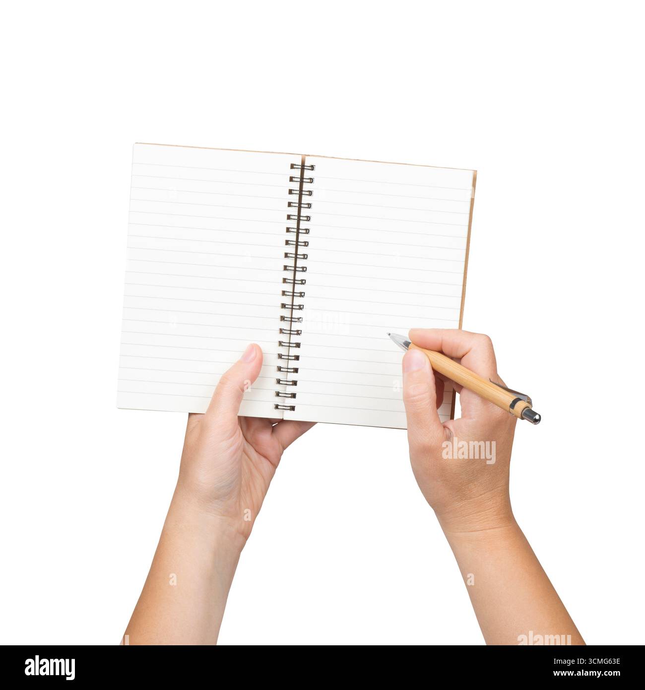 Hände halten Stift und Schreiben auf leerem Notizbuch isoliert auf weißem Hintergrund Stockfoto