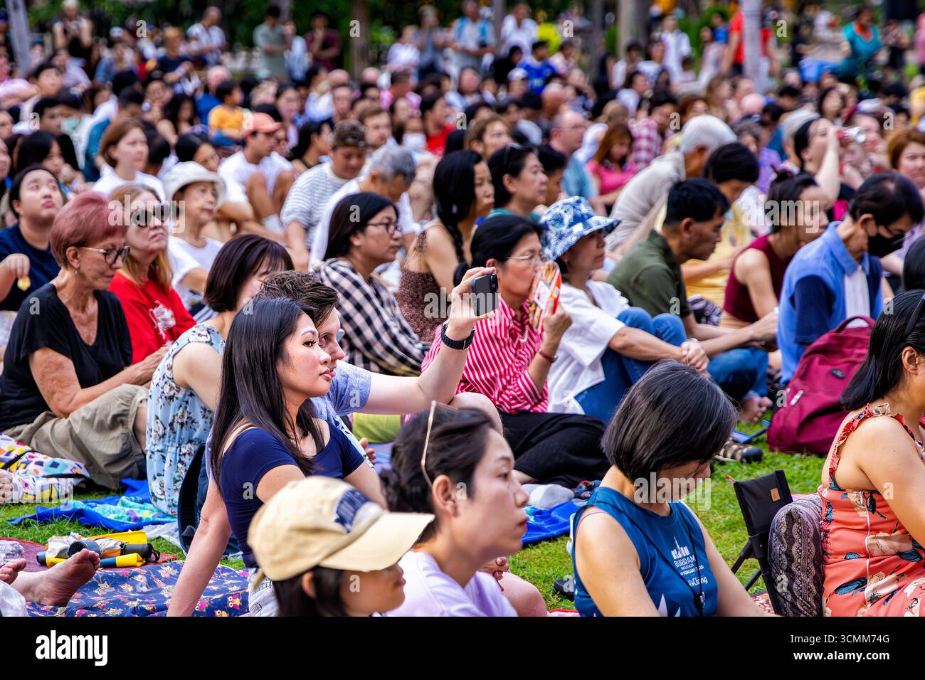 Open-Air-Konzert mit dem Royal Bangkok Symphony Orchestra im Lumphini Park, Bangkok, Thailand Stockfoto