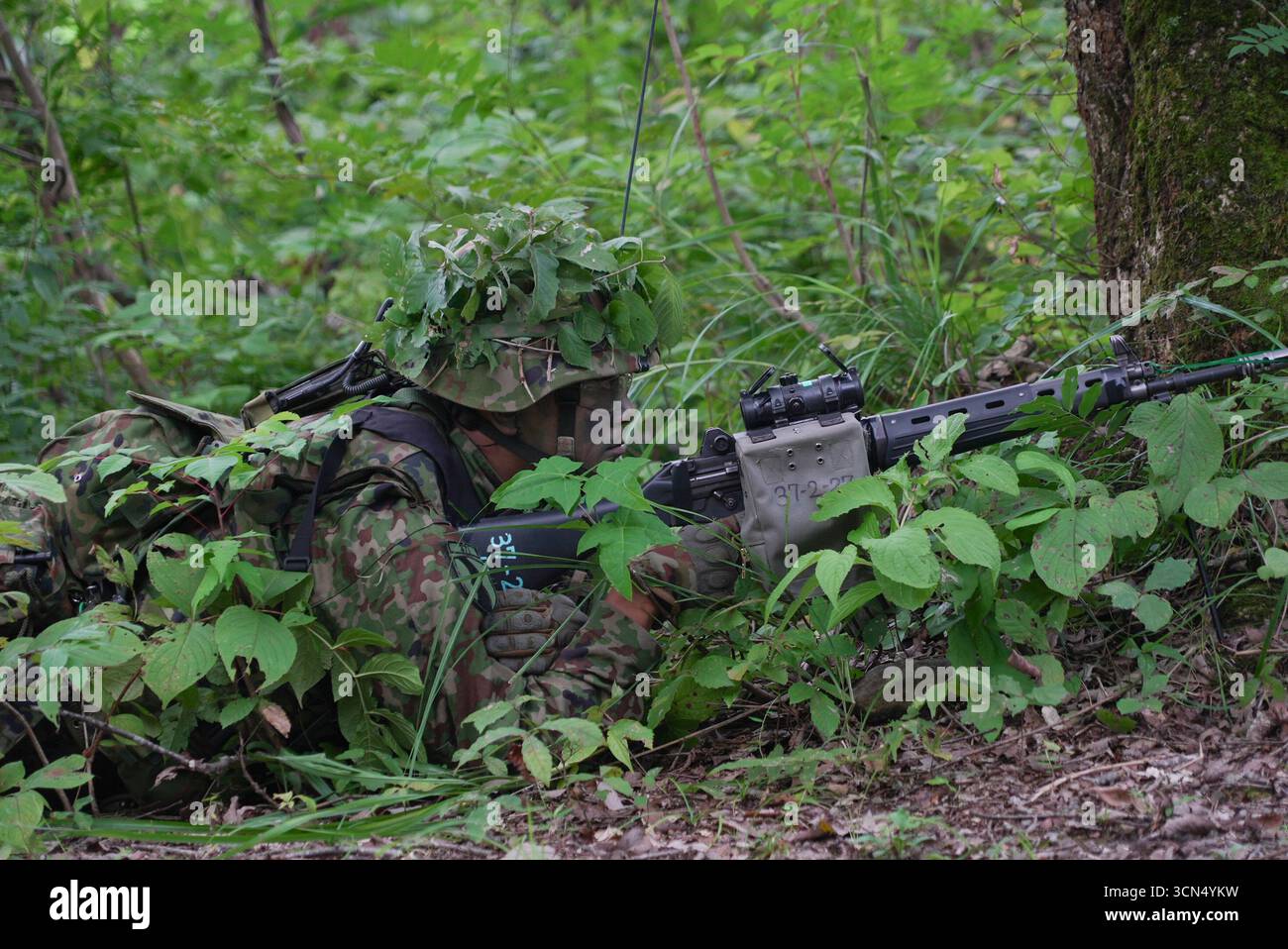A soldier takes part in 'Orient Shield 25', during a joint military exercise with the Japan Ground Self-Defense Force, the U.S. and Australian Armies, at Sekiyama Training Area in Niigata prefecture, Japan on Friday, Sept. 19, 2025 (AP Photo/Ayaka McGill) Stockfoto