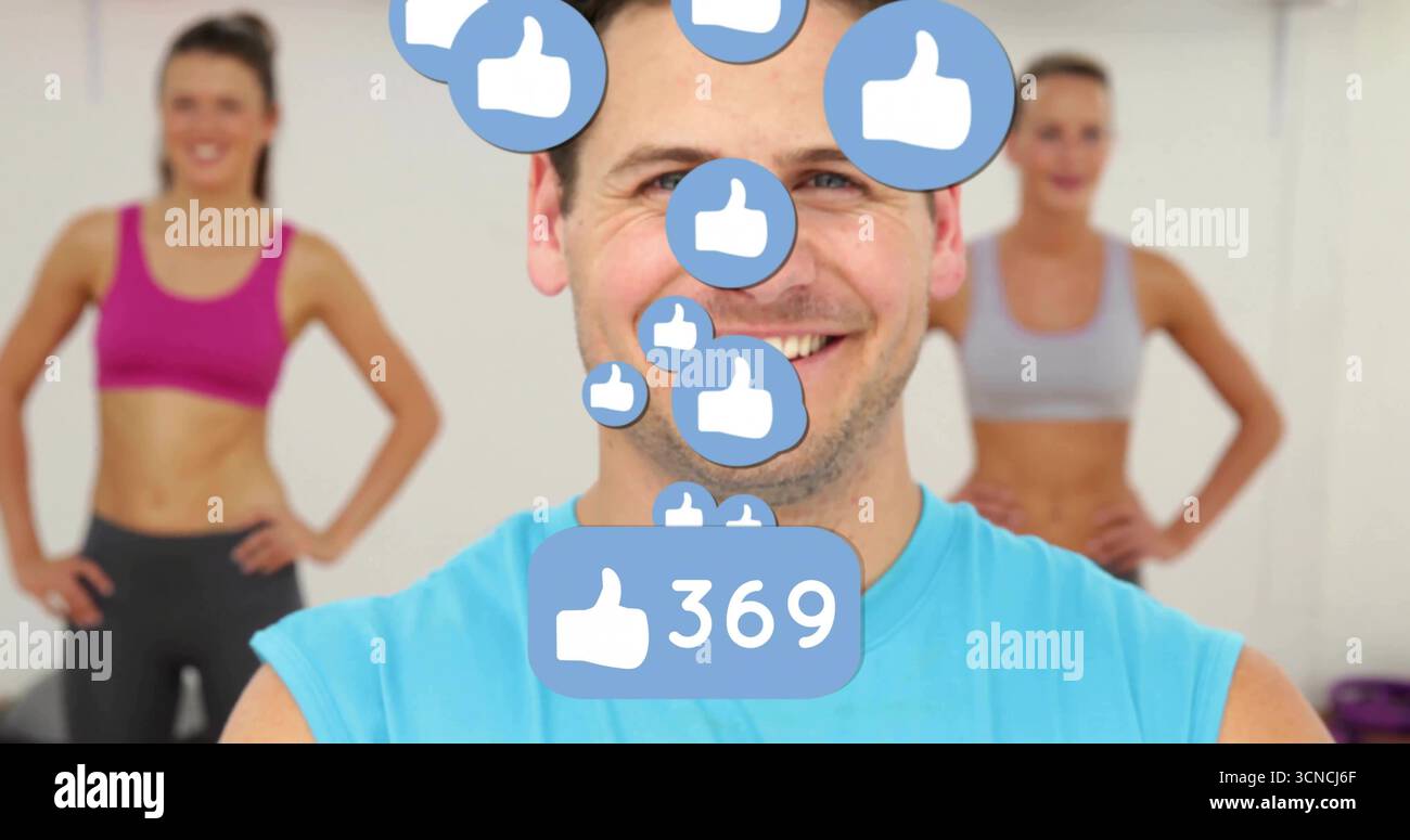 Mann in blauer ärmelloser Spitze posiert im Fitness Studio, mit Daumen-nach-oben-Ikonen und 369 wie Theken Stockfoto