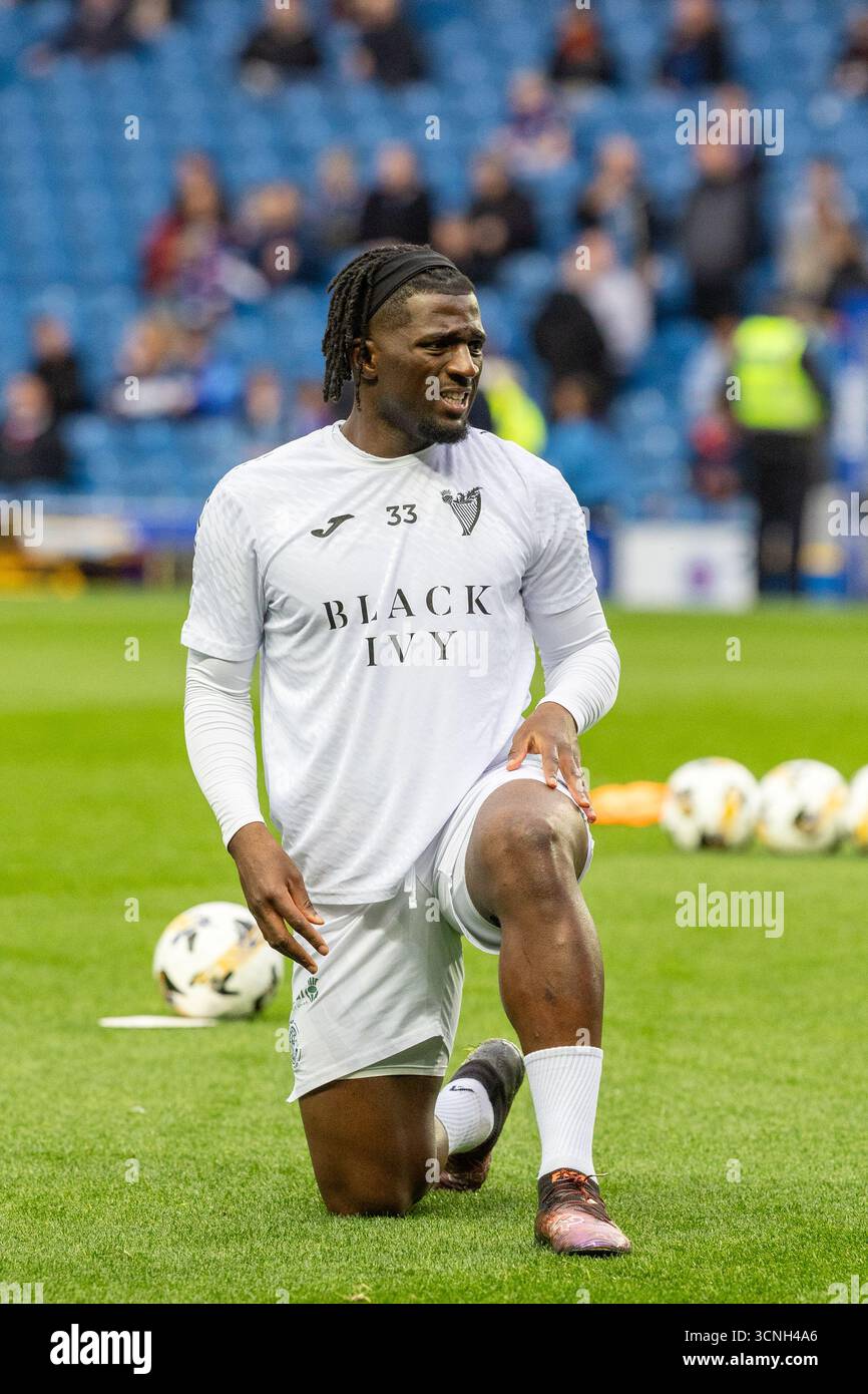 ROCKY BUSHIRI, professioneller Fußballspieler, spielt derzeit für den Hibernian FC. Bild, das während einer Aufwärmphase vor dem Spiel und einer Trainingssitzung aufgenommen wurde. Stockfoto