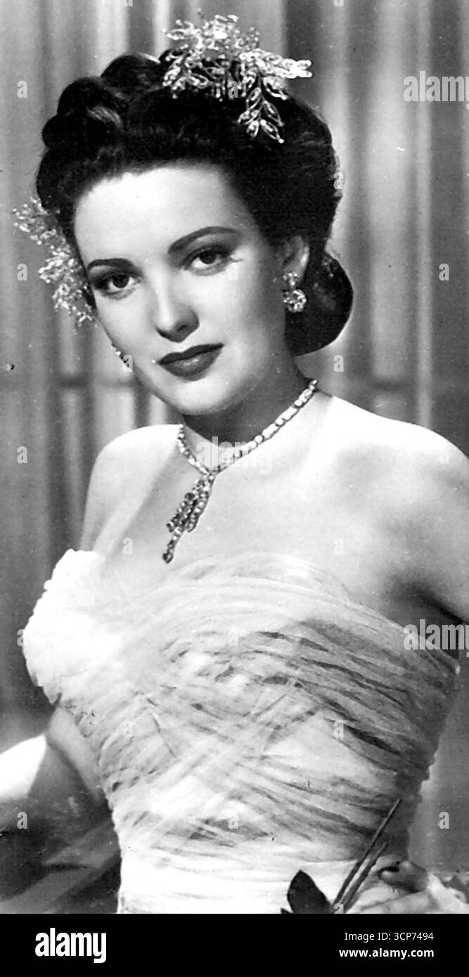 Glamor Girl Deglam-Orized - die Filme, die viel Zeit damit verbringen, die Lilie zu vergolten, haben genau das Gegenteil getan - sie haben Linda Darnell entglamorisiert. Normalerweise sieht sie auf dem Bildschirm aus wie links. Um in "No Way Out" zu spielen, benutzen sie Make-up, um Kreise unter ihre Augen zu legen, ihren hohlen Wangen und einem mürrischen Mund zu geben. Sie sehen das Ergebnis rechts. November 1949. (Foto von AP Wirephoto). Stockfoto