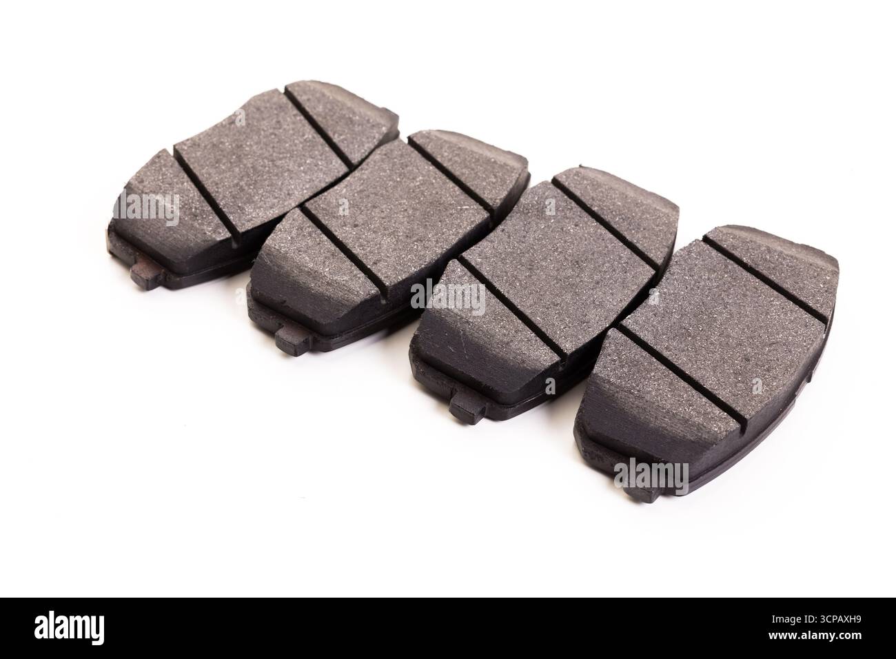 Bremsbeläge bereit für den Einbau in einer Fahrzeugreparatur Stockfoto