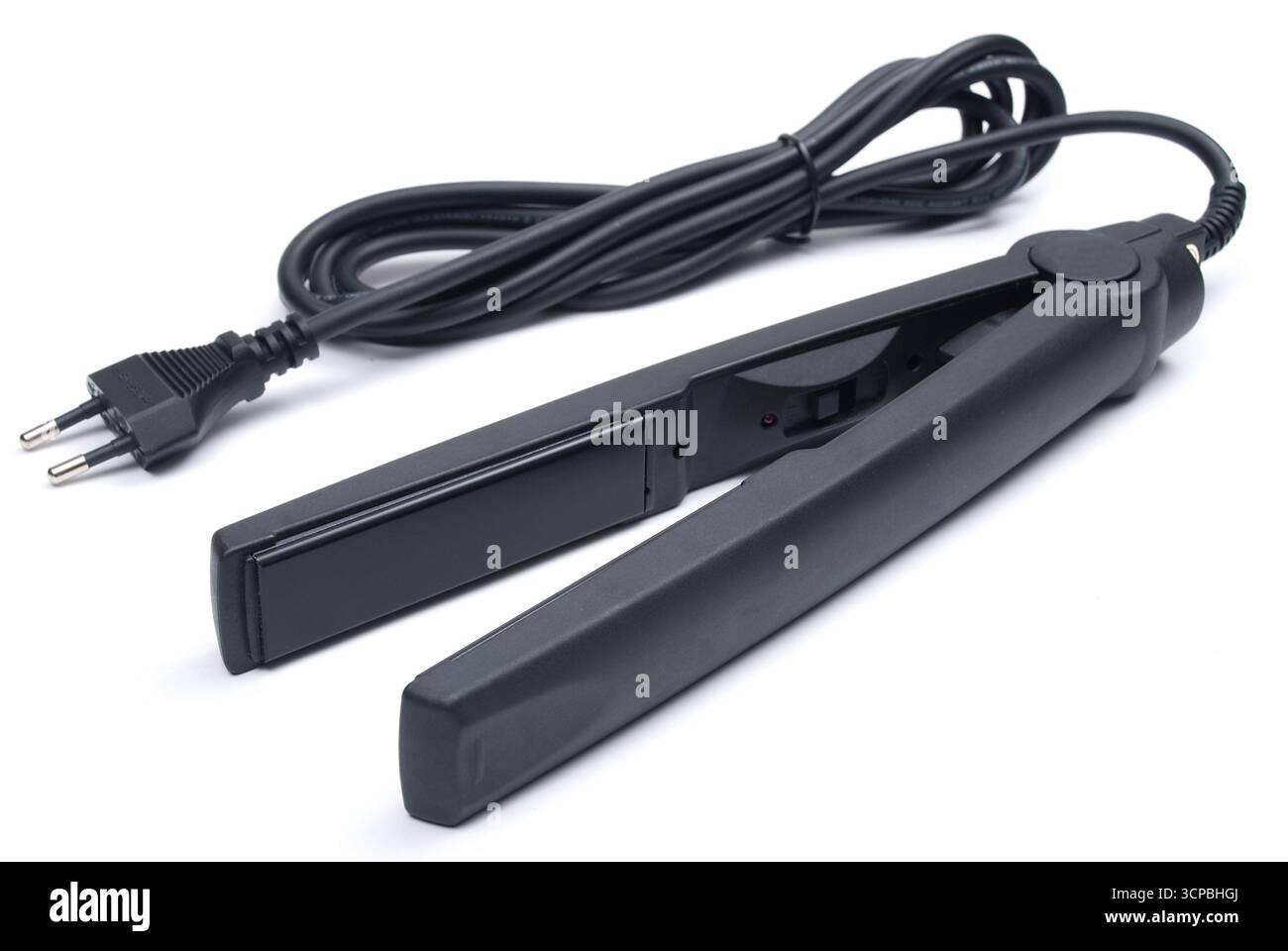 Schwarzer eletronic Haarglätter auf weißem Hintergrund Stockfoto