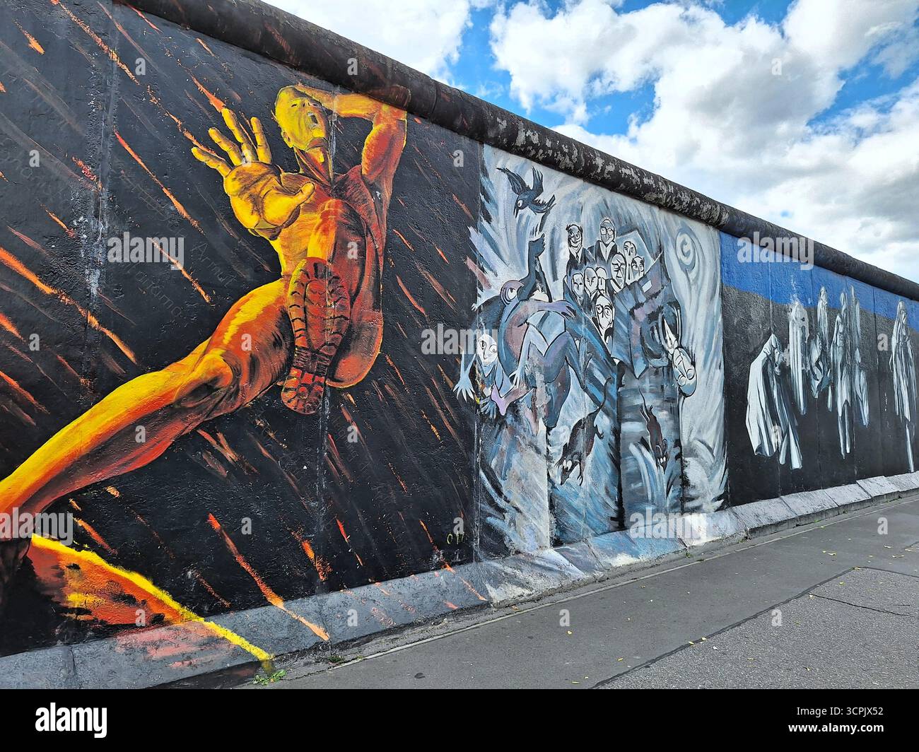 Street Art Wandgemälde zieren historische Stücke der Berliner Mauer in der East Side Gallery in Berlin Stockfoto