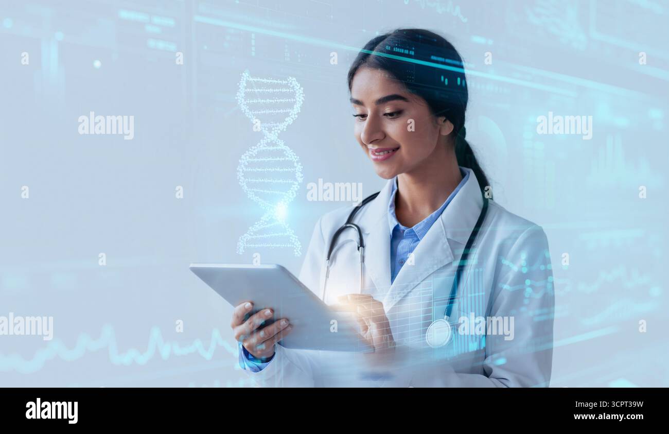 CRISPR-Technologie. Junge fortgeschrittene indische Ärztin, die virtuelle menschliche DNA-Strang auf einem digitalen Tablet studiert Stockfoto