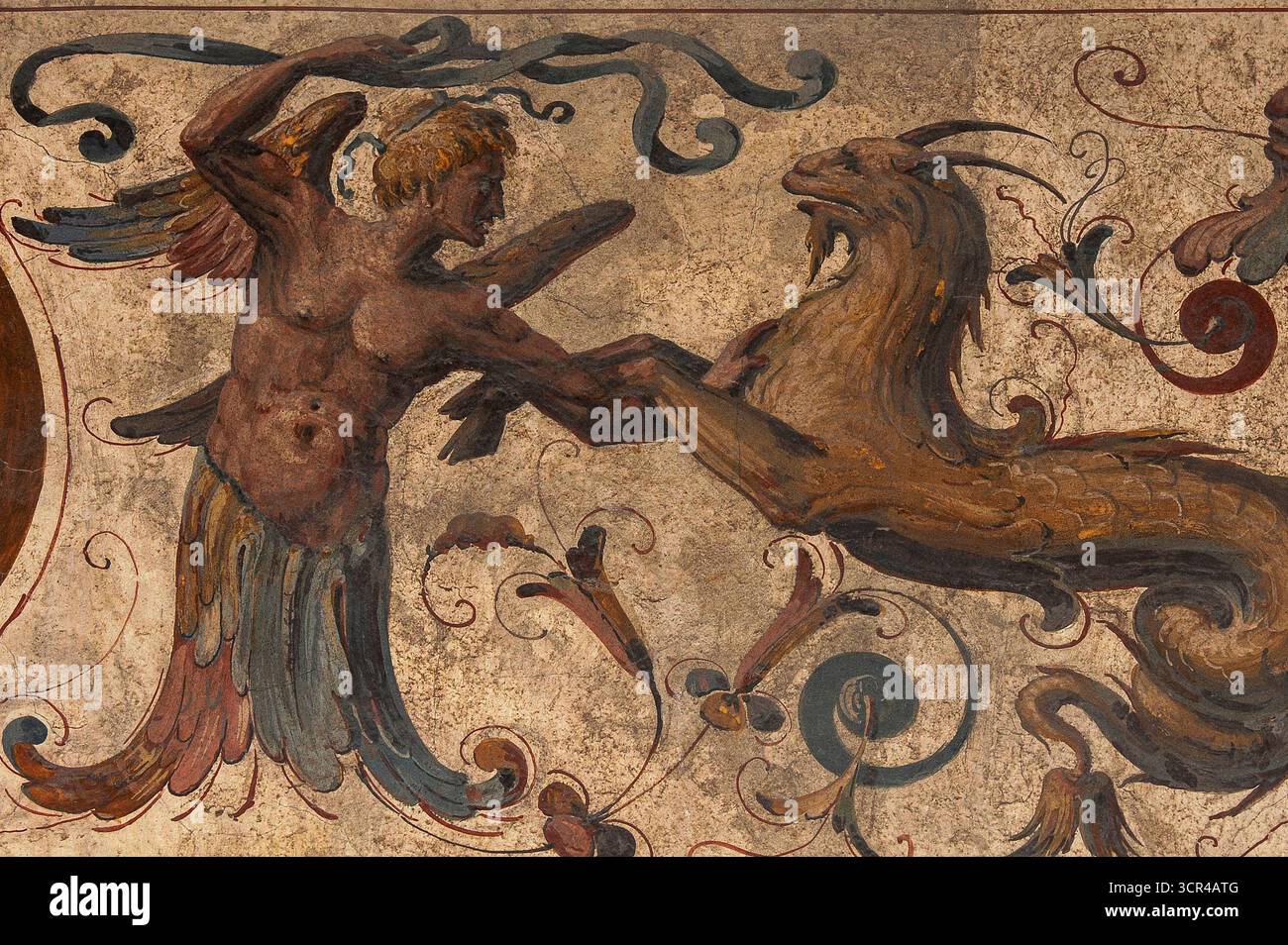 Mythische Hybrid-Kreaturen, ein halb Mensch, halb Vogel und eine Meeresziege, das halb Ziege, halb Fisch Zodiakal Steinbock Symbol, gemalt in der typischen Spätrenaissance Mitte der 1500er Jahre, manieristische Grotesken Fresko im ersten Hof oder Cortile di Michelozzo des Palazzo Vecchio, das mittelalterliche Rathaus auf der Piazza della Signoria, Florenz, Toskana, Italien. Stockfoto