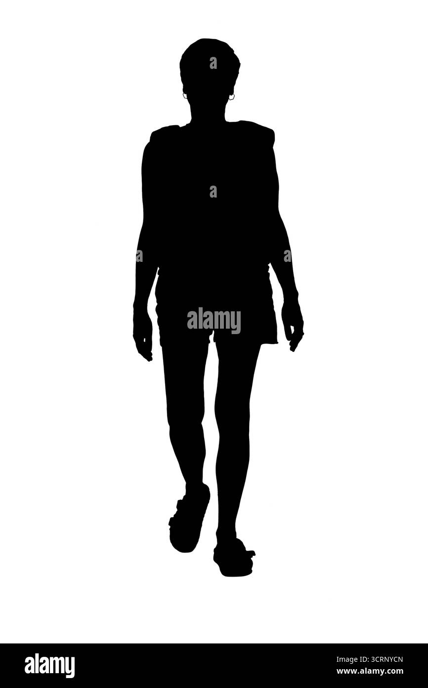 Silhouette einer Frau mit Vorderansicht und Shorts, die laufen Stockfoto