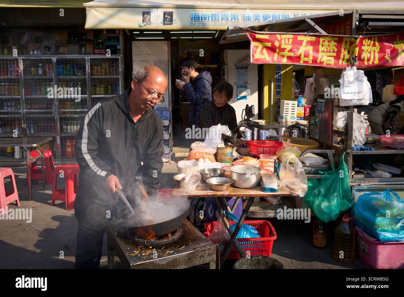 Guangzhou, China. Straßenessen kochen. Stockfoto