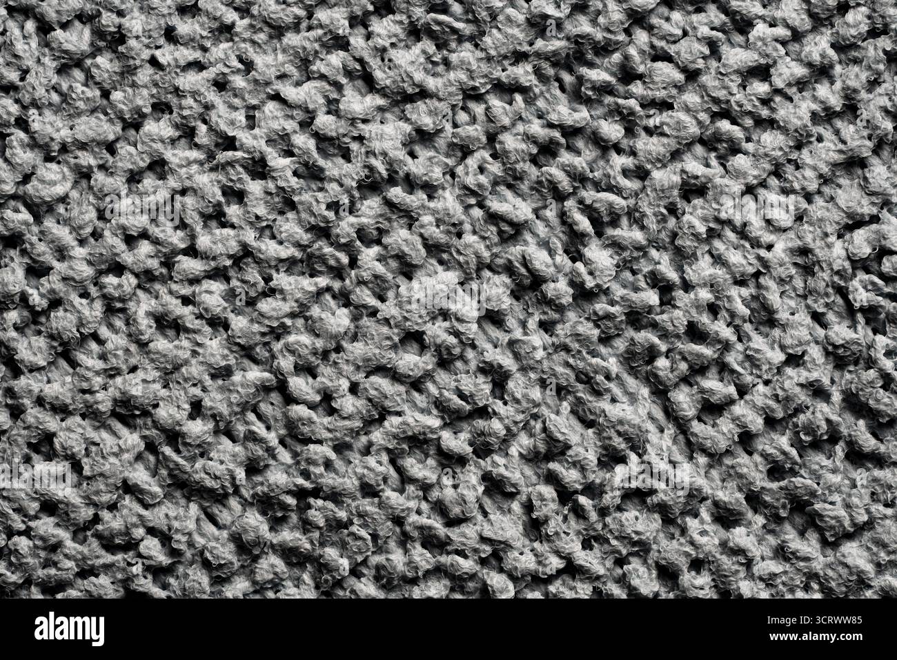Graue Farbe Reinigungstuch Mikrofasertuch Hintergrund und Textur, Nahaufnahme, Draufsicht. Detailmuster für einen Hintergrund mit sauberer Textur Stockfoto