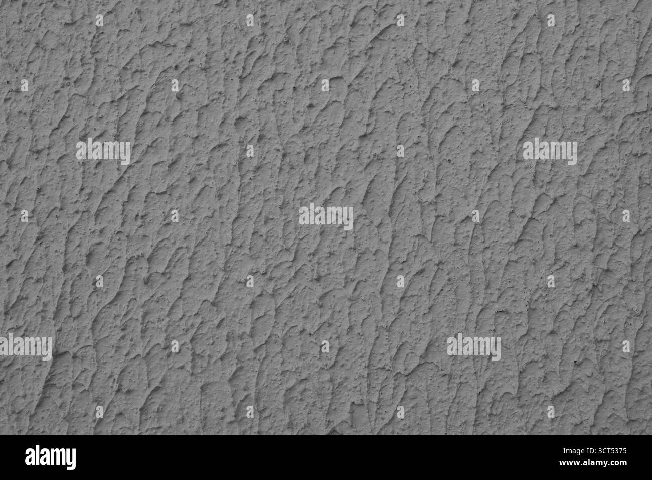 Nahaufnahme einer strukturierten grauen Wand mit rauem Stuck, Gipswandstruktur. Lebendiger Hintergrund, Hintergrundbild, Hintergrund, Designelement. Stockfoto