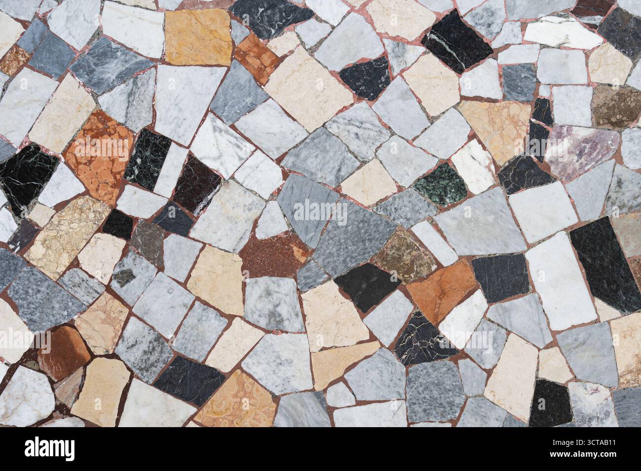Kleiner antiker brauner, beiger, weißer grauer, schwarzer Mosaikfliesen Hintergrund Stockfoto