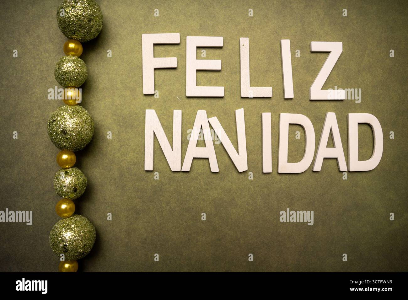 Tekst auf Spanisch Wishing Frohe Christmas Feliz Navidad Stockfoto