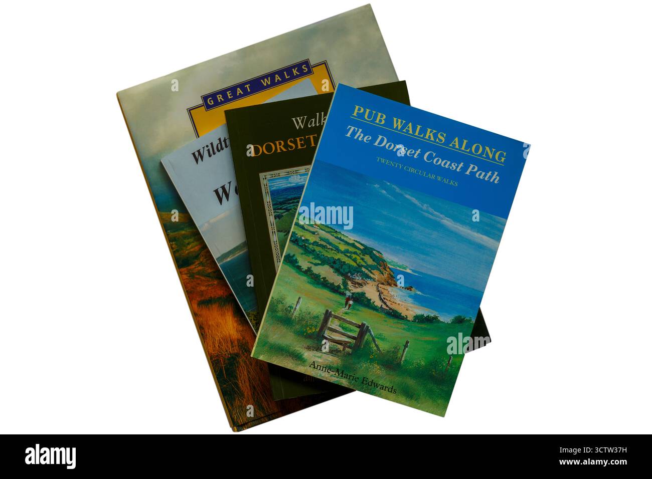 Auswahl an Wanderbüchern mit Pub Spaziergängen entlang des Dorset Coast Path Buch von Anne-Marie Edwards oben isoliert auf weißem Hintergrund Stockfoto