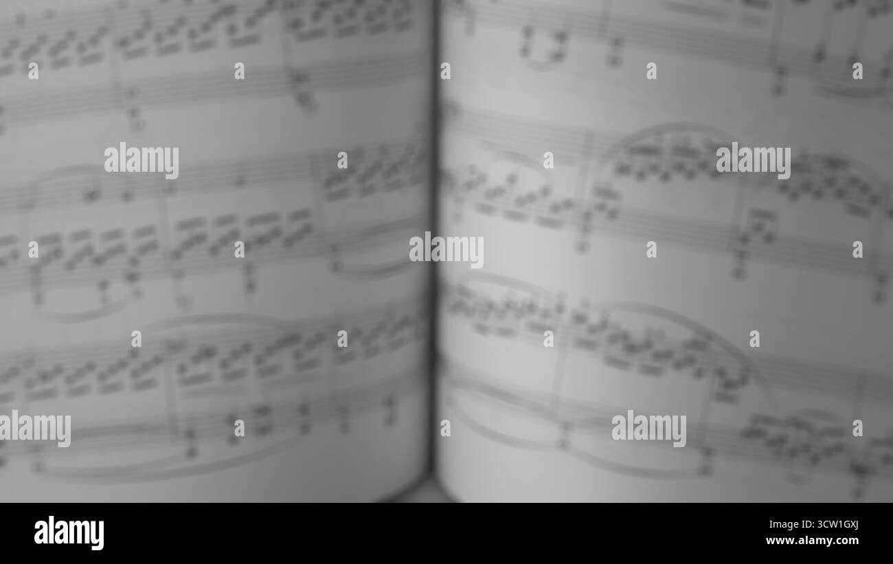 Abstraktes verschwommenes Bild offener Noten mit Noten. Minimalistische und künstlerische Komposition, die Kreativität, Inspiration, Konzentration und Musik symbolisiert Stockfoto