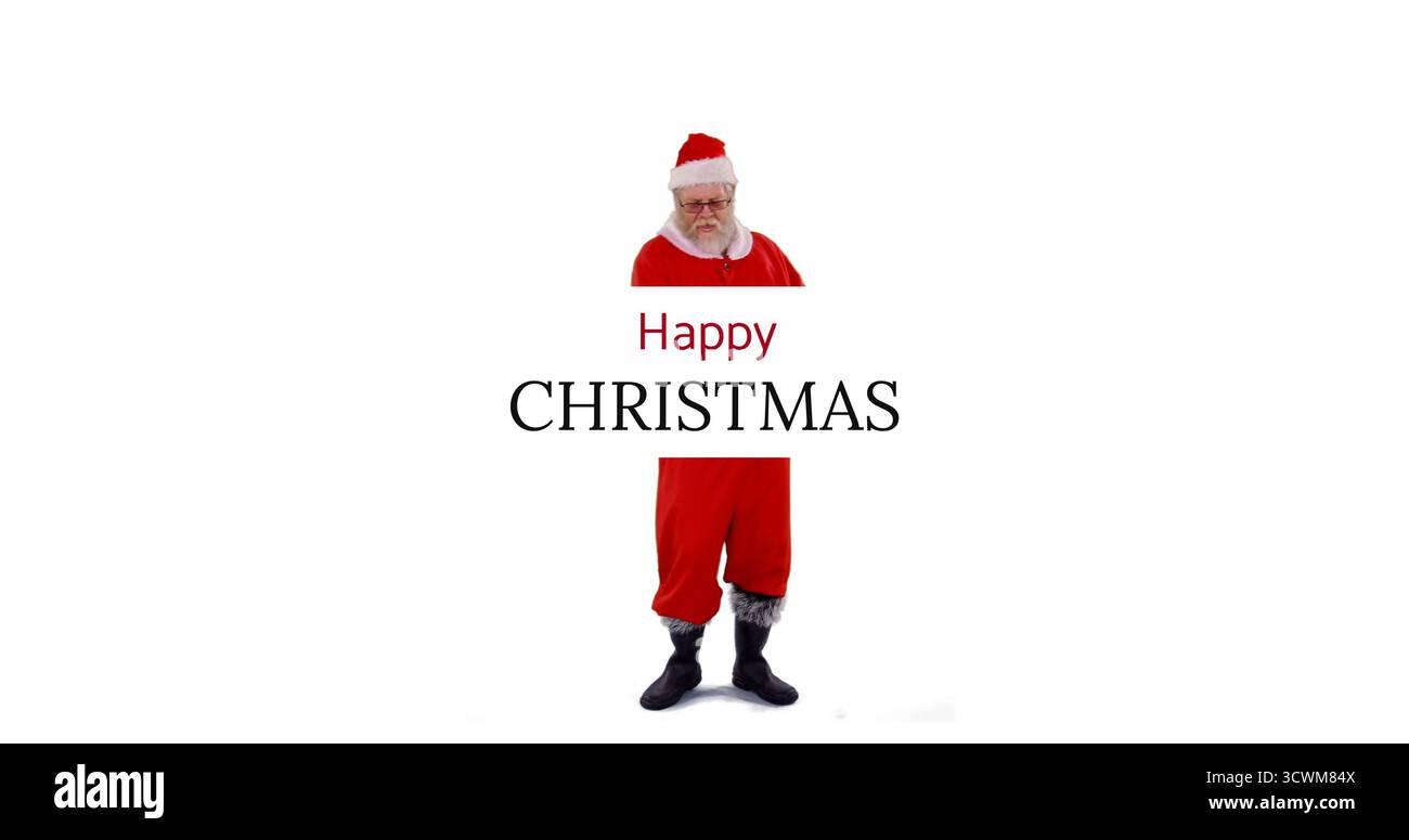 Weihnachtsmann im festlichen Outfit verbreitet Weihnachtsstimmung mit fröhlicher Weihnachtsbotschaft Stockfoto