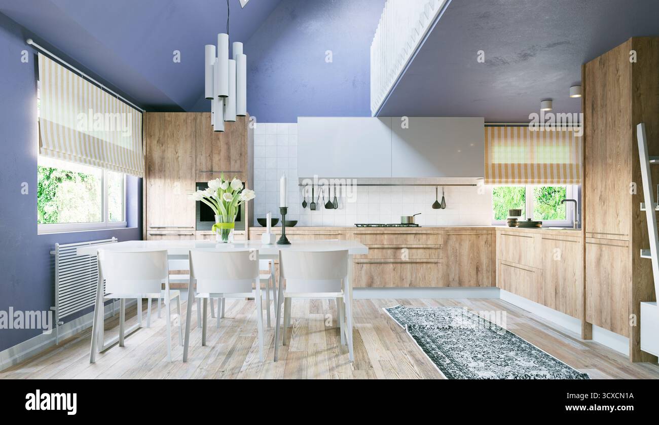 Eine moderne Küche und ein Esszimmer mit hellen Holzschränken, einem weißen Tisch und blauen Wänden. Stockfoto