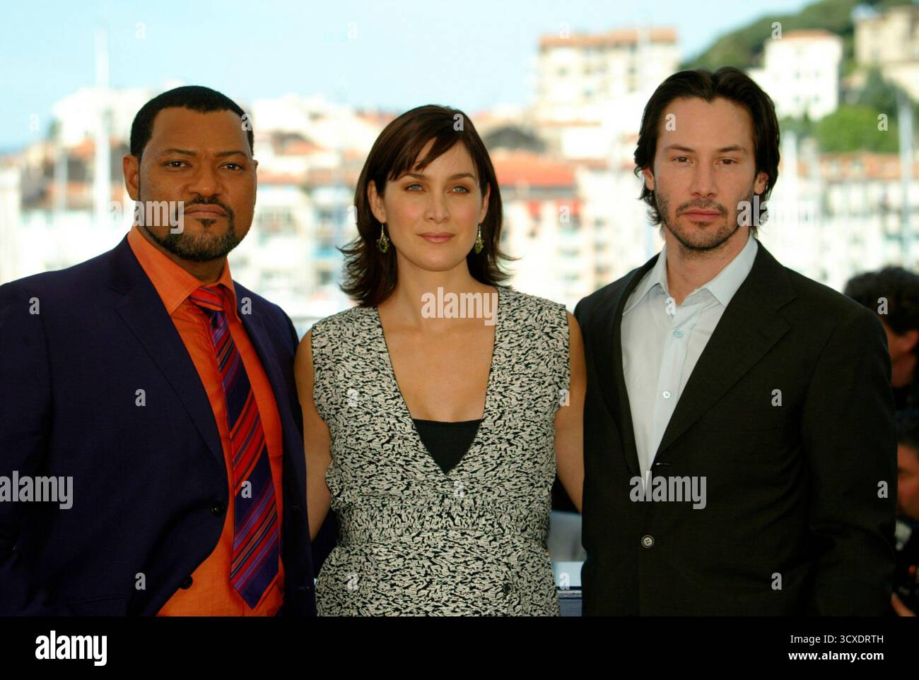 Laurence Fishburne, Carrie Anne Moss und Keanu Reeves werben für Matrix Reloaded auf den Filmfestspielen von Cannes 2003. Cannes, Frankreich, 14. Mai 2003 Stockfoto