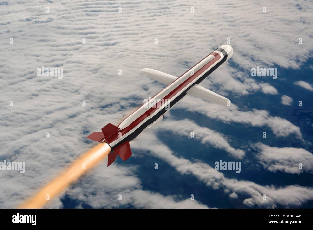 Eine amerikanische Unterschallrakete fliegt über den Wolken und hinterlässt eine helle Feuerspur. Stockfoto
