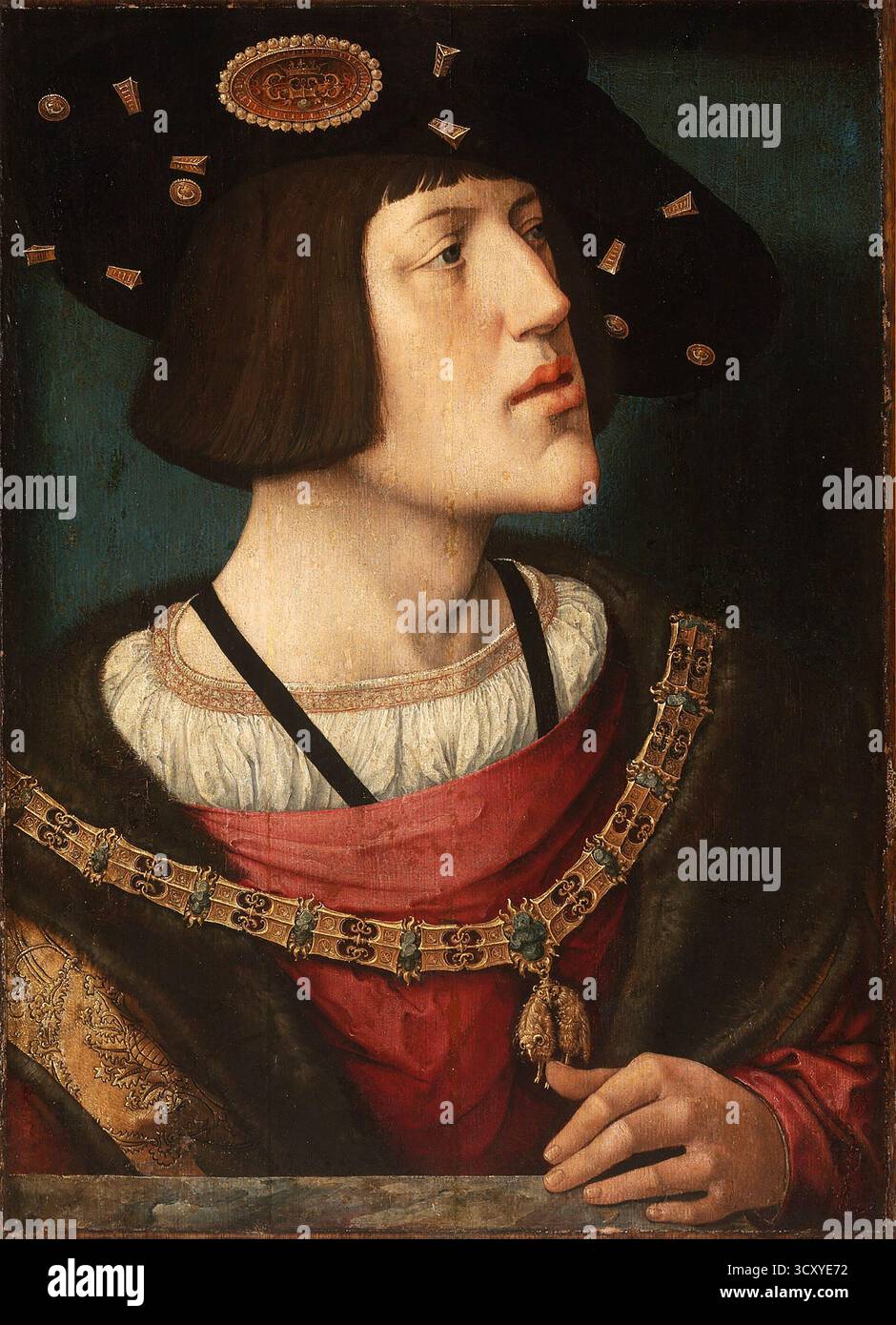 KARL V., Kaiser des Heiligen Römischen Reiches (1500–1558) in einem Gemälde von Bernard Van Orley aus dem Jahr 1519, in seinem Hut bis zum Abzeichen des Ordens vom Goldenen Vlies. Stockfoto KARL V., Kaiser des Heiligen Römischen Reiches (1500–1558) in einem Gemälde von Bernard Van Orley aus dem Jahr 1519, in seinem Hut bis zum Abzeichen des Ordens vom Goldenen Vlies. Stockfoto
