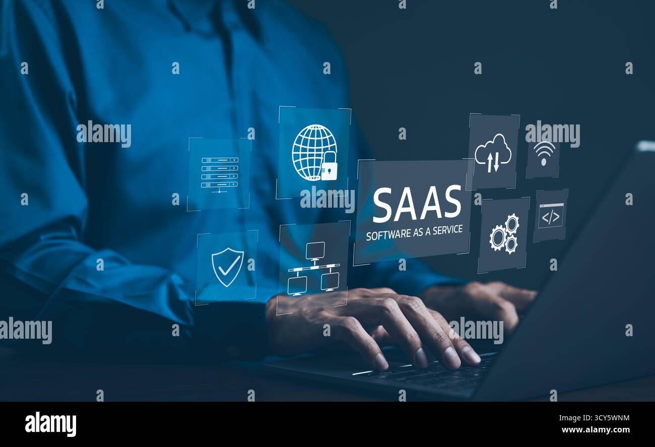 SaaS-Konzept, Software as a Service, Ein Mann auf Laptop mit digitalen Symbolen, die verschiedene Aspekte von Software as a Service (SaaS) darstellen Stockfoto