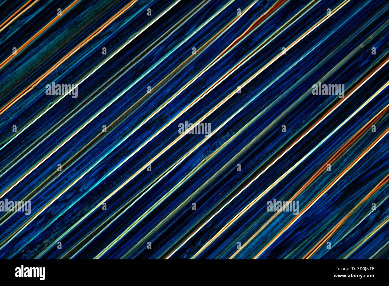 Hintergrund mit diagonalen Streifen, die mit Holzstäben geformt wurden Stockfoto