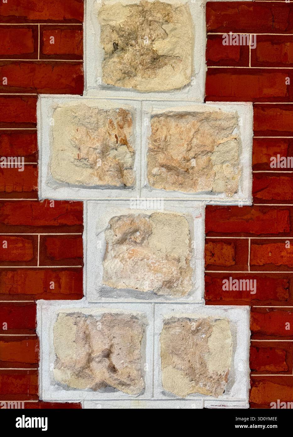 Kalkstein und rote Ziegelmauer mit Verdeckungen - Smartphone-aufgenommenes Stockfoto