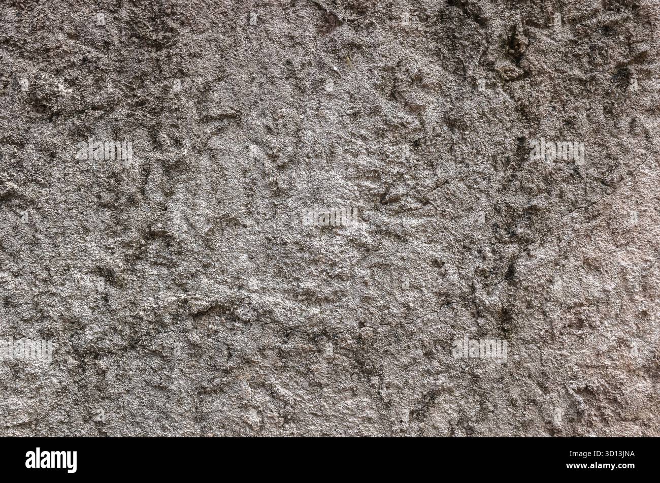 Hintergrund der rauen Steinmauer in brauner Farbe Stockfoto