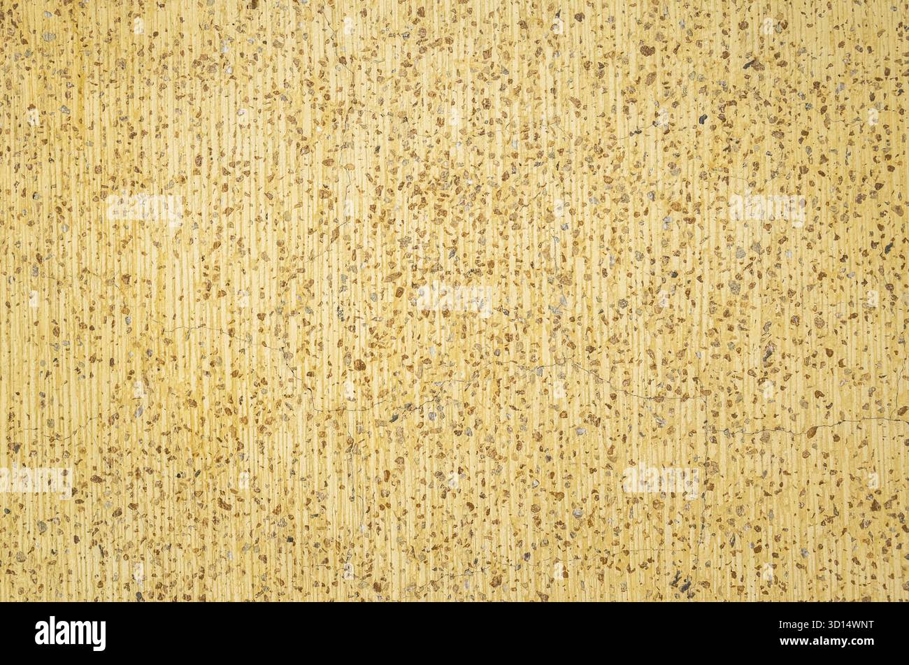 Hintergrund der rauen Steinmauer in gelbbrauner Farbe Stockfoto