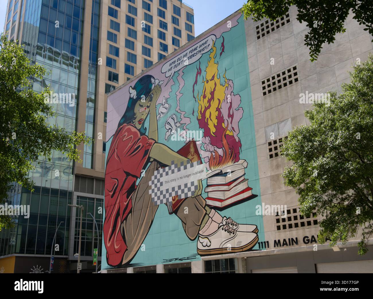 D*Face’s Wandgemälde mit dem Titel „Books and Freedom“ in Houston, Texas, zeigt die Bedeutung von Bildung und Redefreiheit. Stockfoto