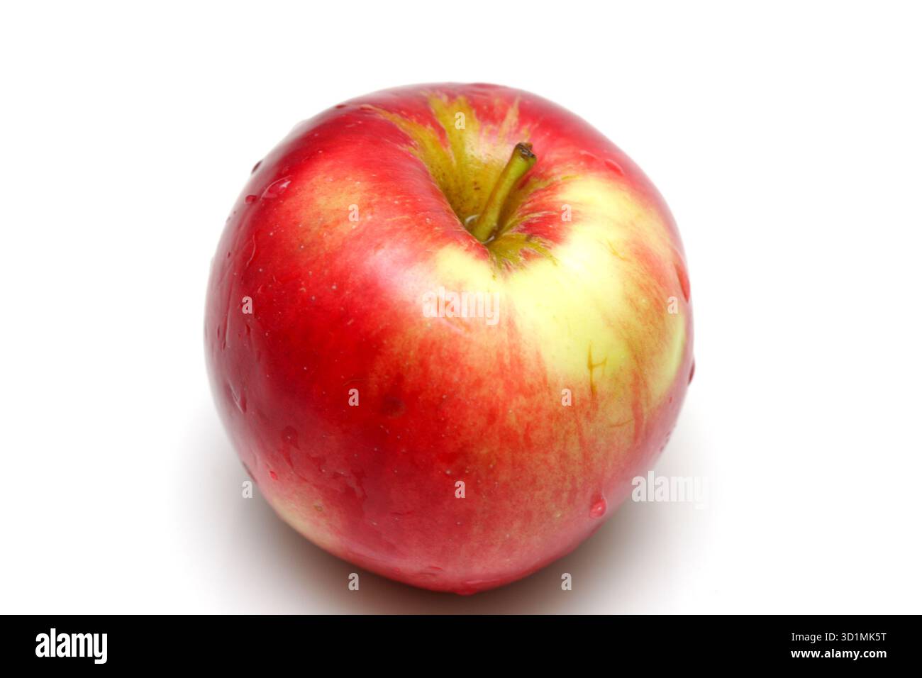 Roter Apfel, isoliert auf weiss Stockfoto