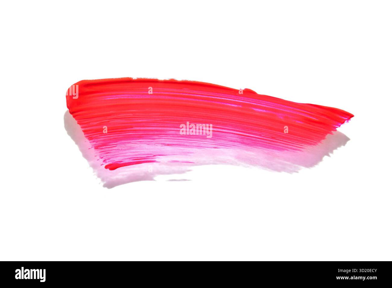 Leuchtendes Rot und Rosa mit Pinselstrich auf weißem Hintergrund, der kräftige Farben hervorhebt Stockfoto