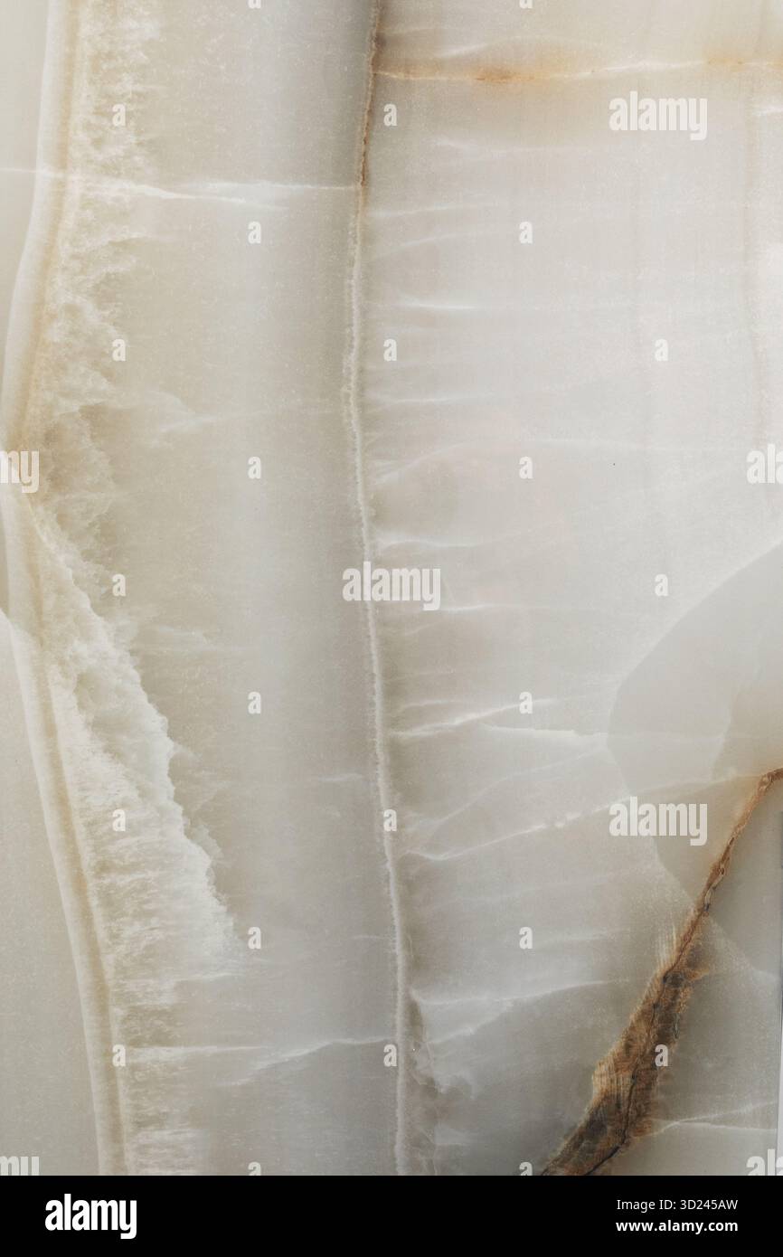 Wunderschöne Nahaufnahme aus natürlichem Onyx-Stein mit komplizierten Mustern und Farben in einer glatten Textur Stockfoto