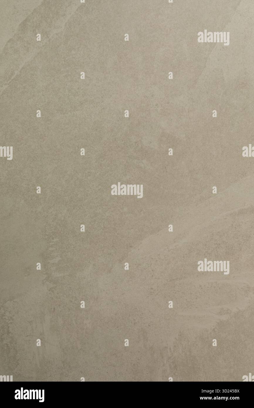 Die Oberflächenstruktur in sanften, neutralen Tönen zeigt natürliche Variationen und dezente Muster, perfekt für die Inspiration des Innendesigns Stockfoto