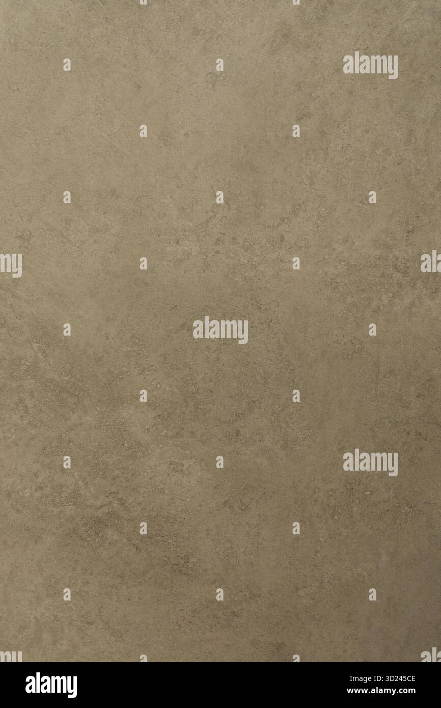 Nahaufnahme einer strukturierten Oberfläche in einem warmen, neutralen Ton bei Tageslicht Stockfoto