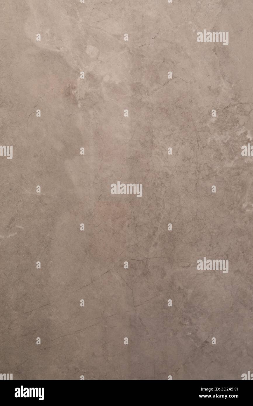 Strukturierte Wandfläche mit natürlichen Mustern und dezenten Farbvariationen in minimalistischer Umgebung Stockfoto